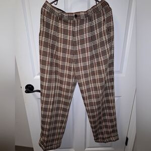 A pair of vintage Possi plaid pants in a waist size of 32. Retro, 70s business.